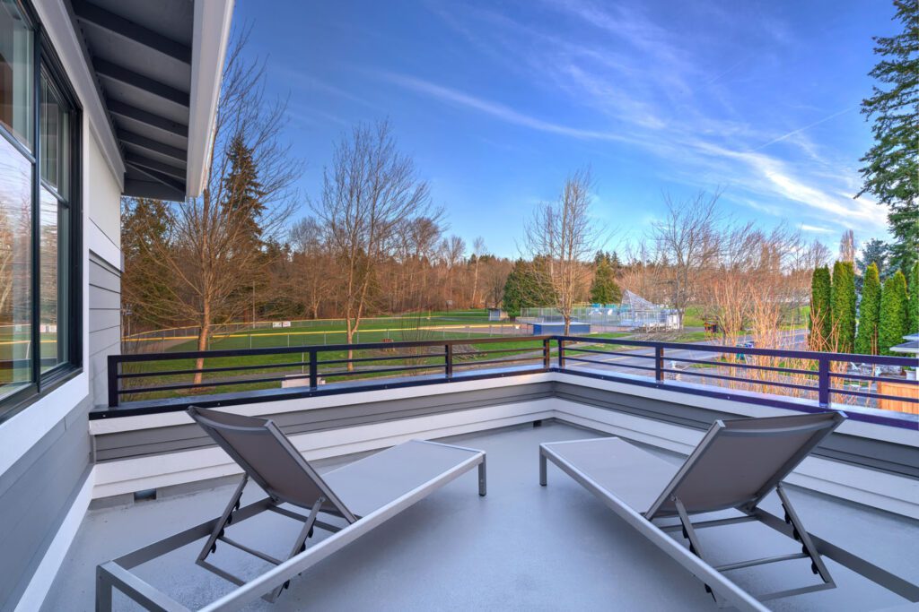 New luxury home with second floor deck balcony overlooking park